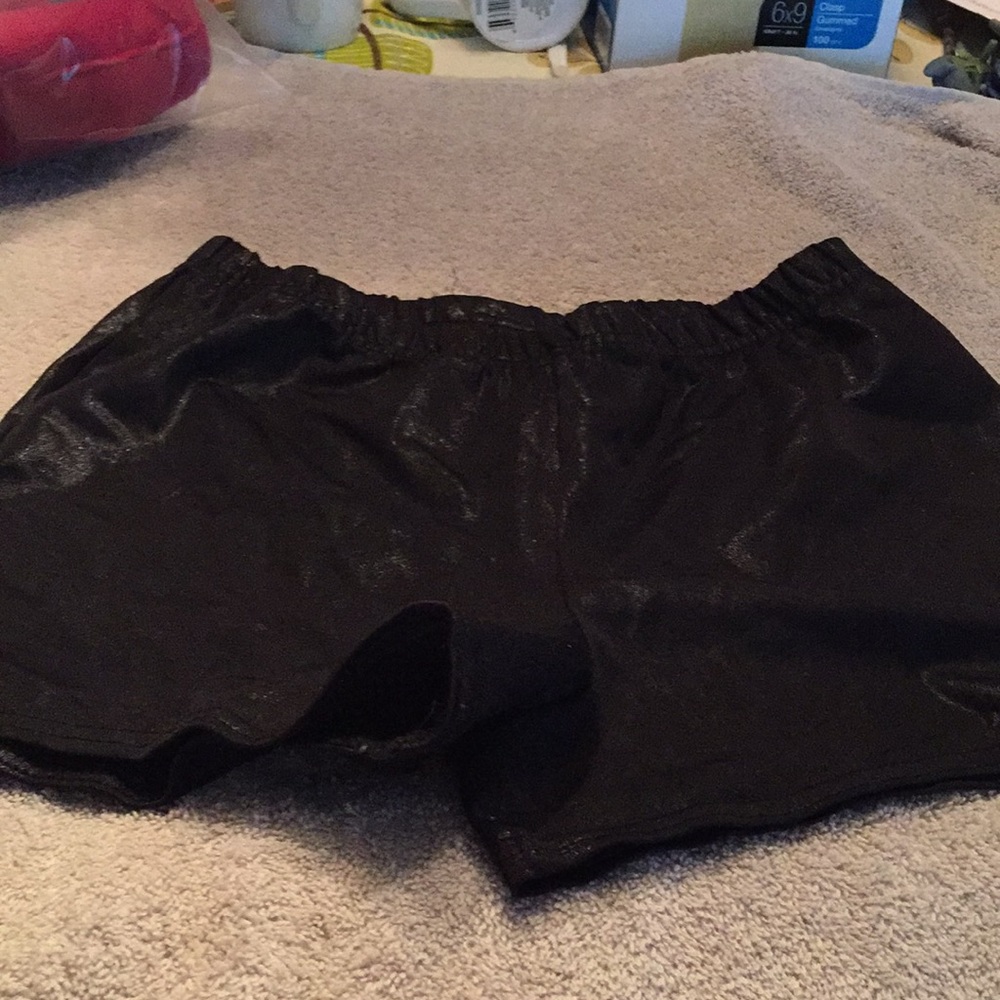 Black shiny short shorts